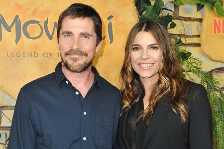 Emmeline's romantic parents Christian Bale and Sibi Blazic.